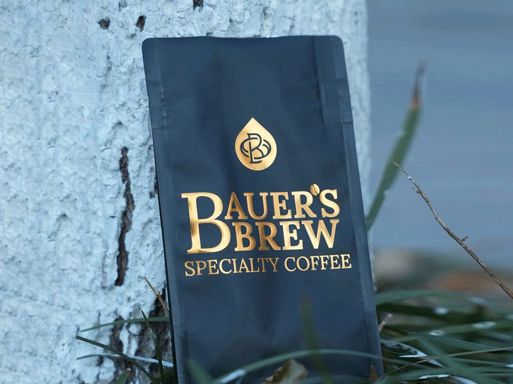 Black coffee bag with gold hot stamping for premium brand identity