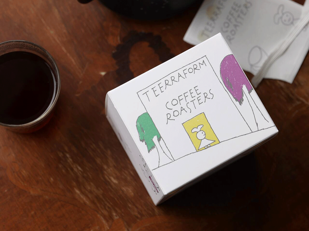 Illustrated custom coffee box packaging highlighting brand personality and creative design