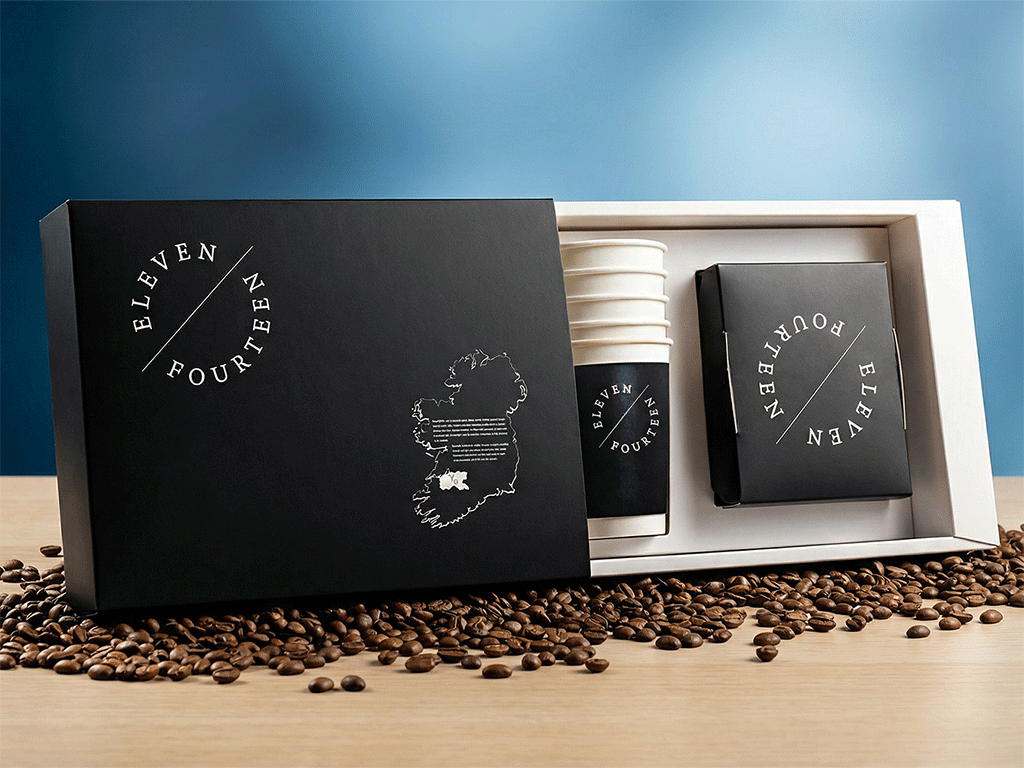 A set of coffee cups and coffee packaging boxes from the Eleven Fourteen brand,
