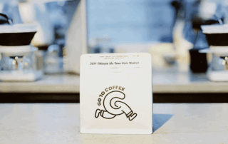 Close-up of a multi-layered coffee bag, showcasing its protection and design.