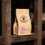 Kraft paper coffee bag with eco-friendly compostable packaging.