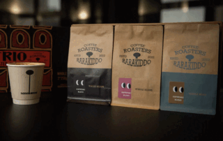 coffee packaging design tips for 2026 featuring kraft coffee bags and branded coffee cup