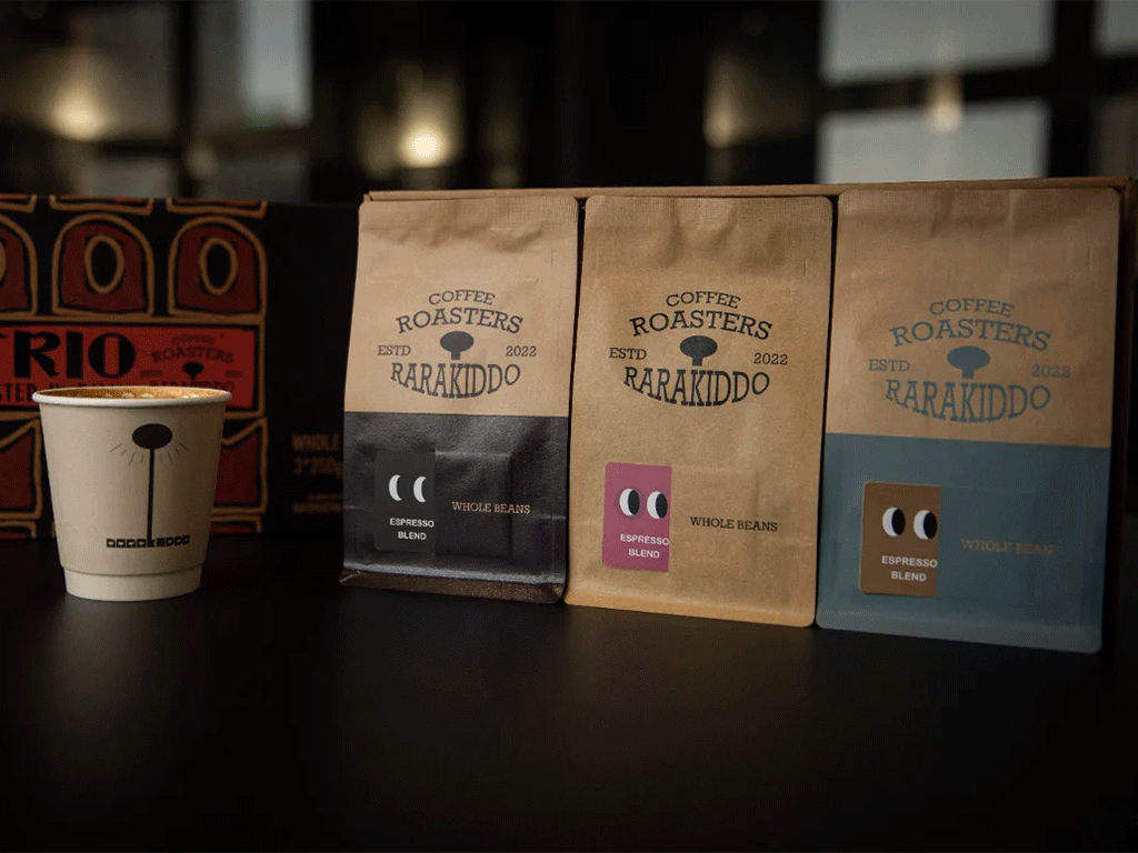 coffee packaging design tips for 2026 featuring kraft coffee bags and branded coffee cup