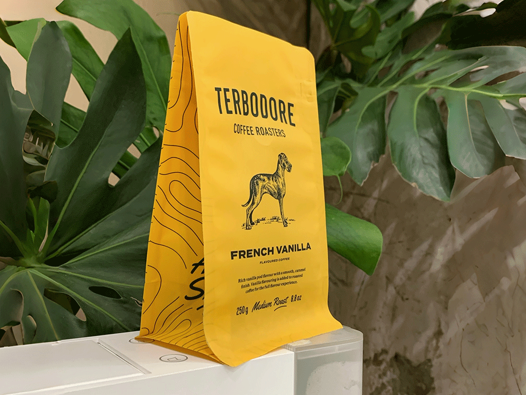 yellow coffee bag with front printing in coffee packaging article