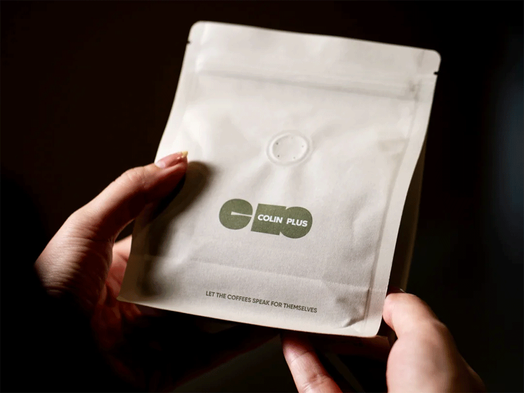 coffee packaging bag with valve shown in hand for flavor protection