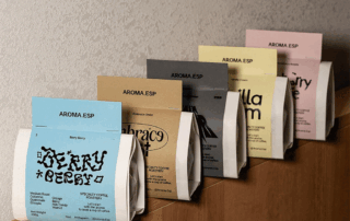 custom coffee bag sleeves on multiple coffee bags for different coffee products