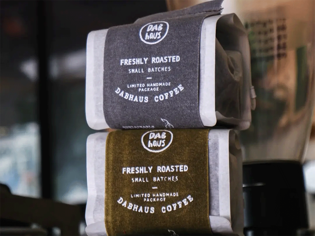 wrap-around coffee bag sleeves on stacked coffee bags for small batch coffee