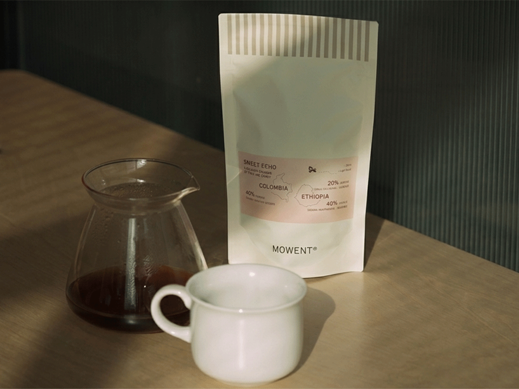 printed coffee bag displayed with brewed coffee for specialty coffee branding