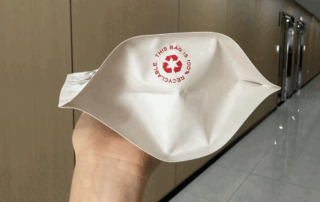 recyclable coffee bag with recycling symbol