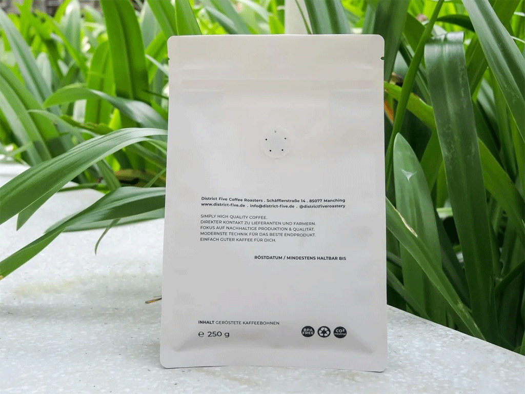 coffee bag back panel with recycling icons and packaging information