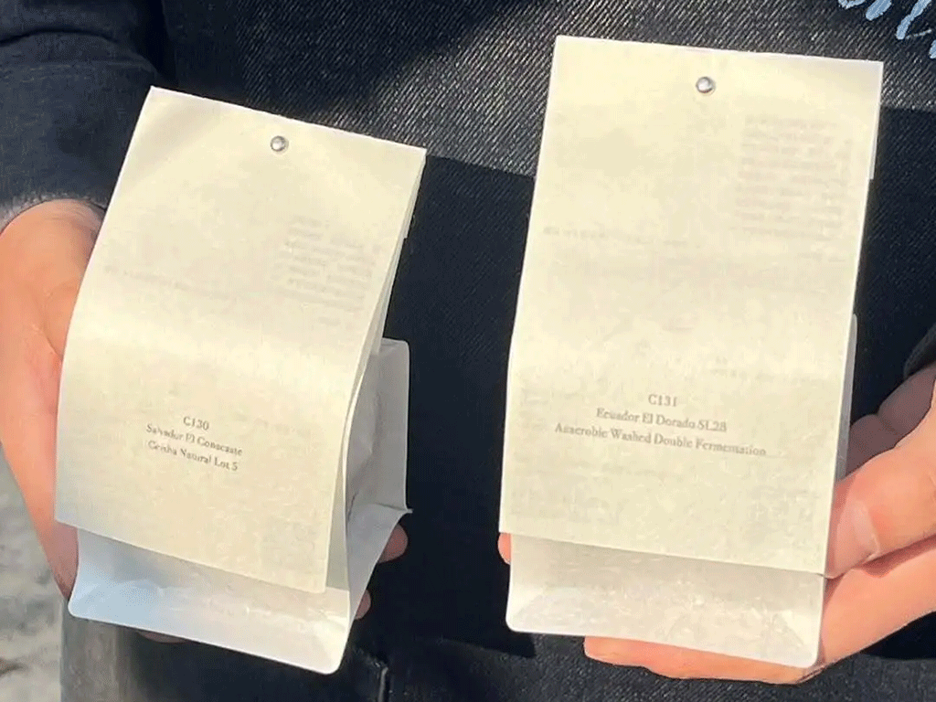 Are_coffee_tasting_cards_worth_adding_to_-specialty_coffee_packaging_1 Coffee tasting cards displaying origin and processing details for specialty coffee releases
