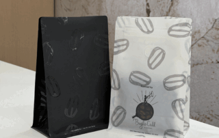 Coffee packaging bags with matte and gloss contrast finish displayed side by side in studio lighting