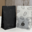 Coffee packaging bags featuring matte and gloss contrast finishes displayed side by side under studio lighting.