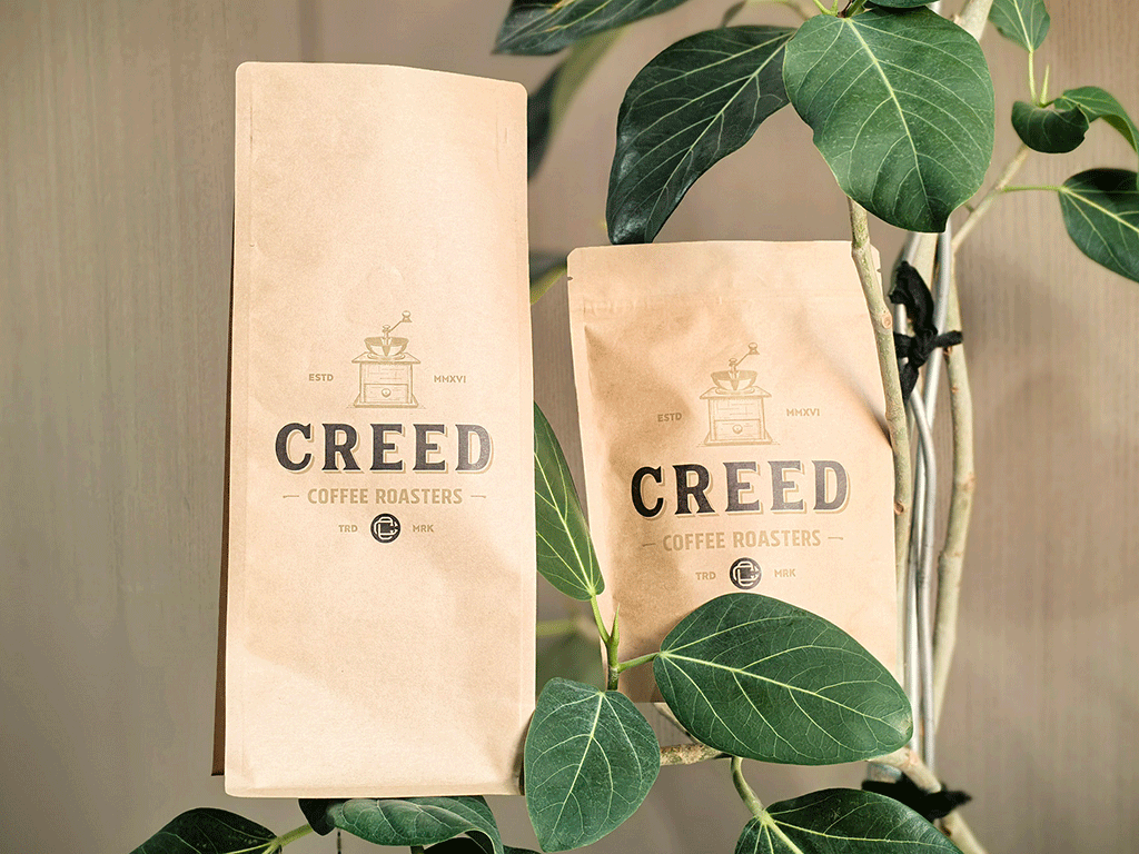 What_Are_the_Benefits_of_Custom_Stand-Up_Pouches_for_Coffee_1 Flat bottom coffee bag and custom stand up pouch comparison for specialty coffee packaging solutions