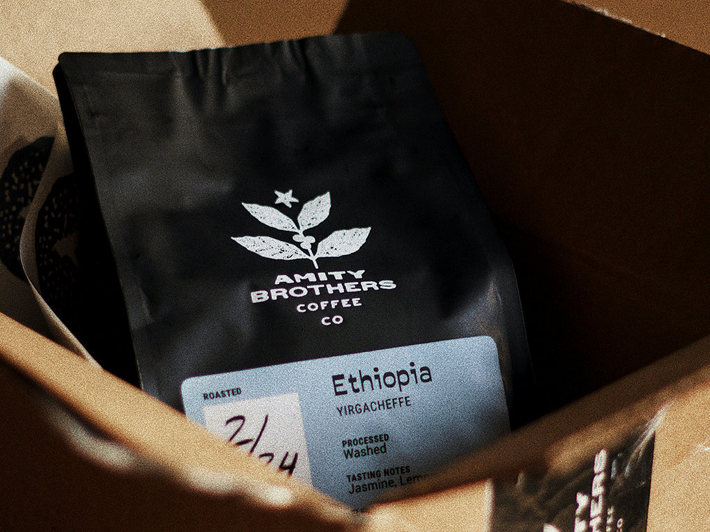 Black coffee bag with origin label for a coffee packaging redesign
