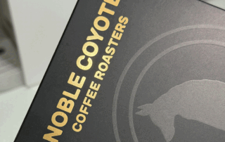 Black coffee box packaging with gold hot foil stamping on the surface lettering