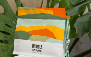 Custom coffee bag with colorful artwork and modern packaging design for a coffee roaster