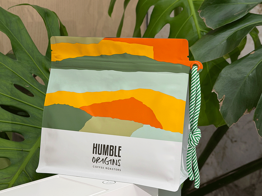 How_Far_in_Advance_Should_Coffee_Roasters_Order_Coffee_Bean_Bags_1 Custom coffee bag with colorful artwork and modern packaging design for a coffee roaster