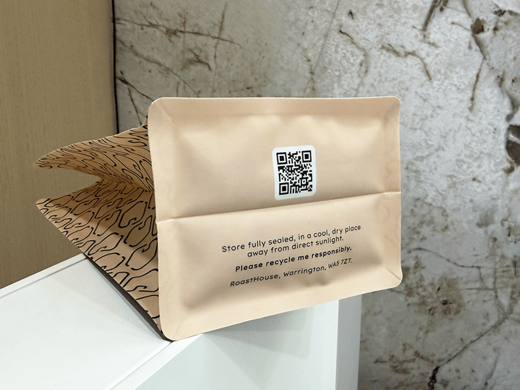 Back view of a recyclable coffee bag with recycling instructions for coffee packaging