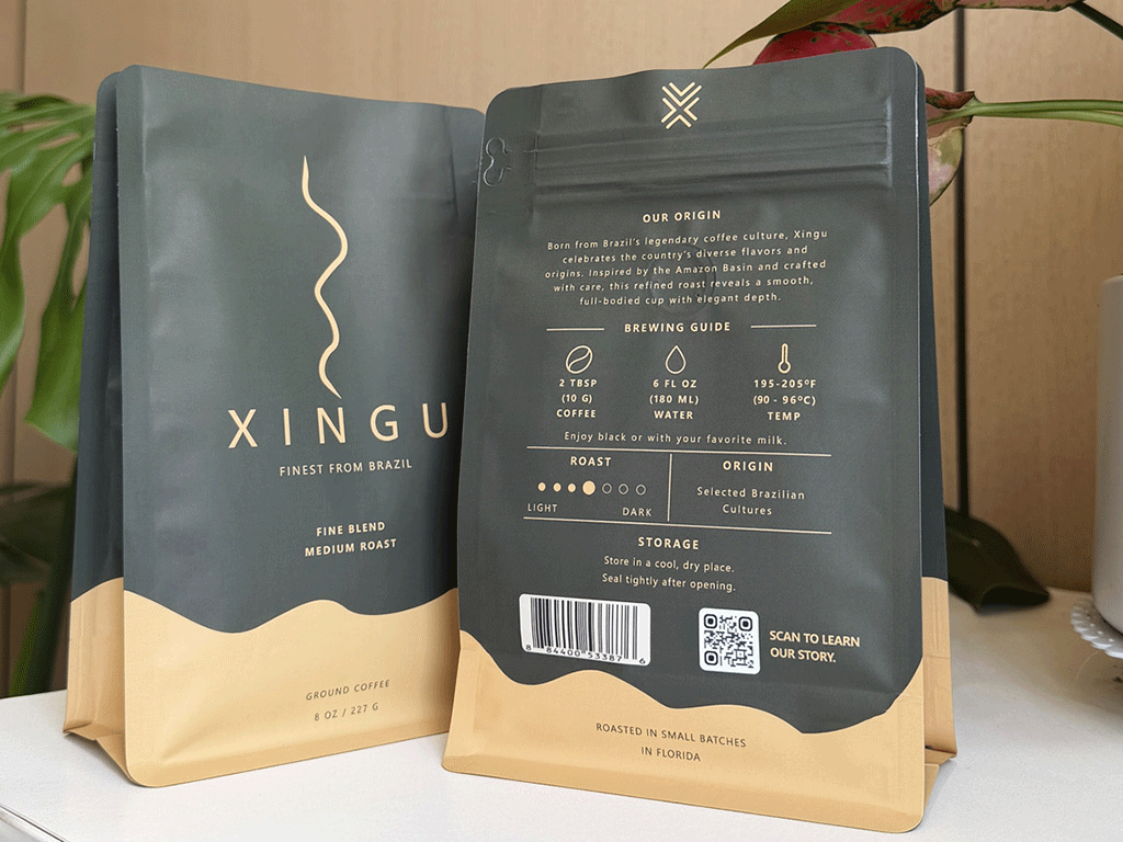 two custom coffee bags showing front and back designs with resealable zipper closure