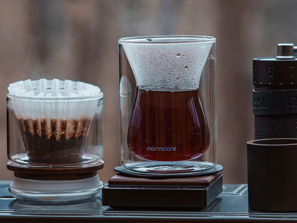 Pour-over coffee brewer and server with freshly brewed coffee