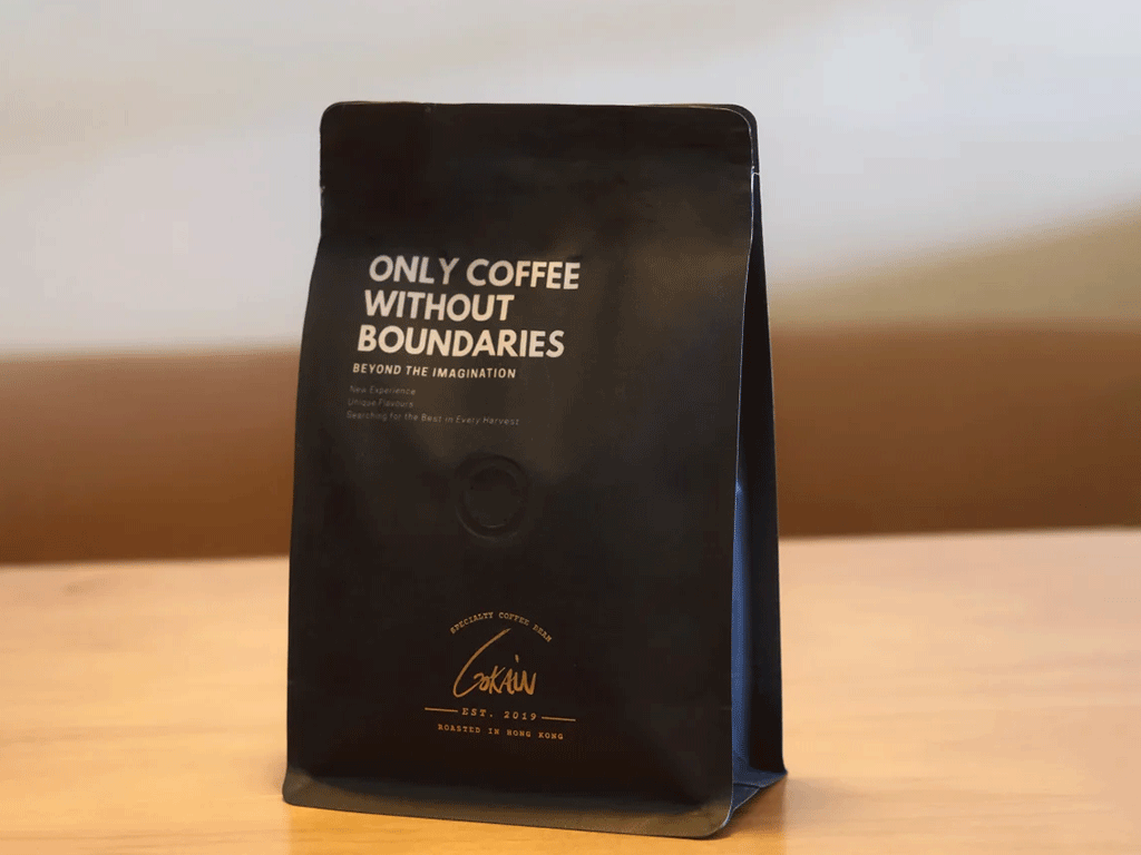 Minimal black coffee bag featuring elegant coffee packaging designs